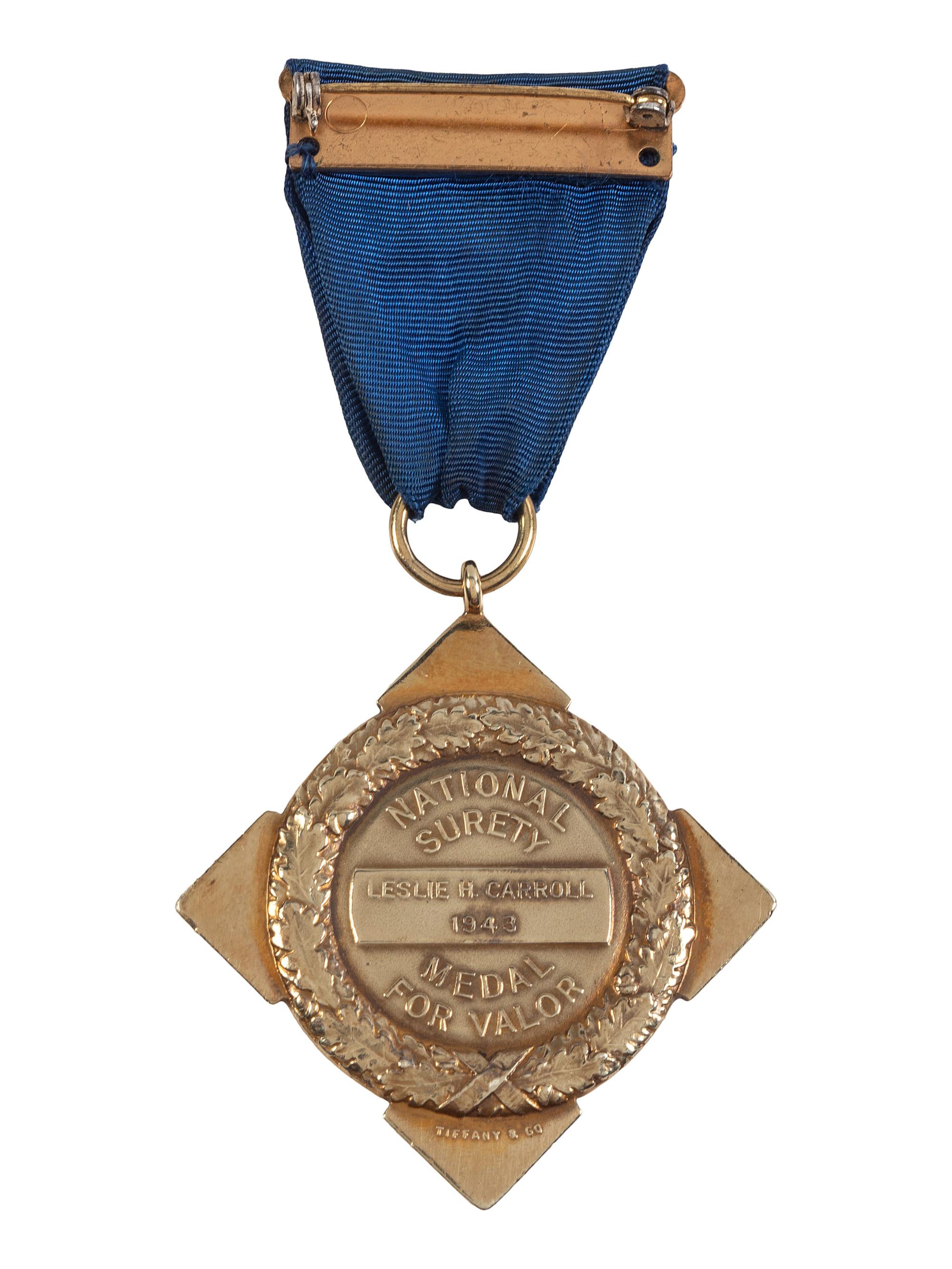 [OCCUPATIONAL]. National Surety Medal for Valor presented to African American police officer Leslie H. Carroll. New York: Tiffany & Co., 1943.