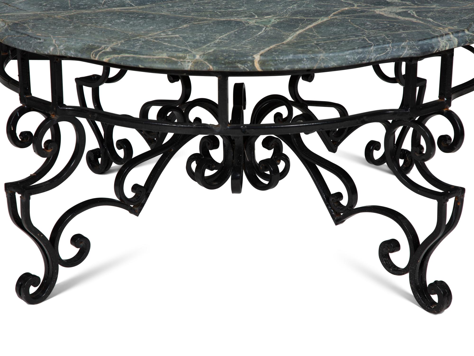 A Wrought Iron Marble-Top Coffee Table