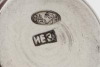 A Group of Eleven Russian Silver Beakers, Various Makers, Late 19th/Early 20th Century, each having a flared rim, the bodies worked to
