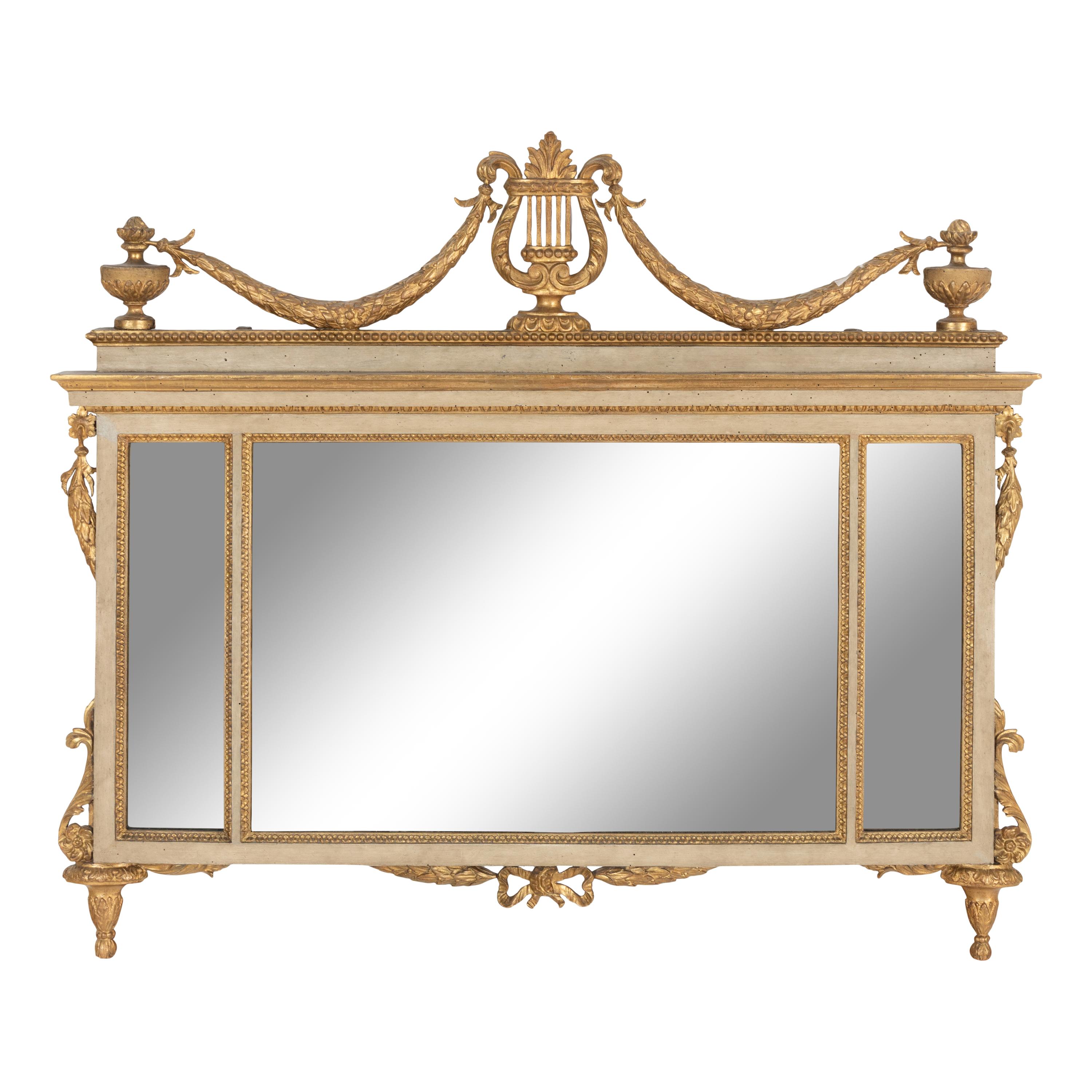 An Italian Neoclassical White Painted and Giltwood Mirror