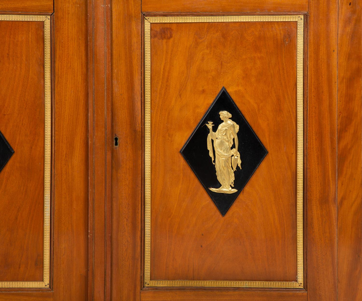 A Continental Neoclassical Mahogany Cabinet