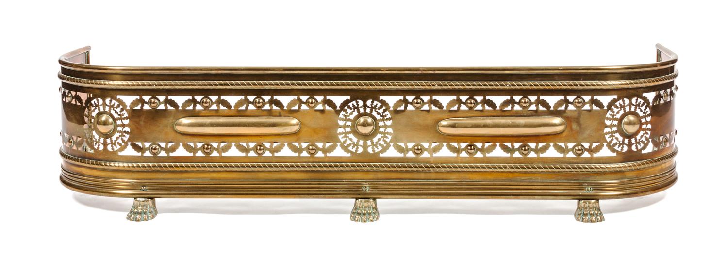An English Brass Fire Fender Height 11 x width 48 x depth 13 1/2 inches.