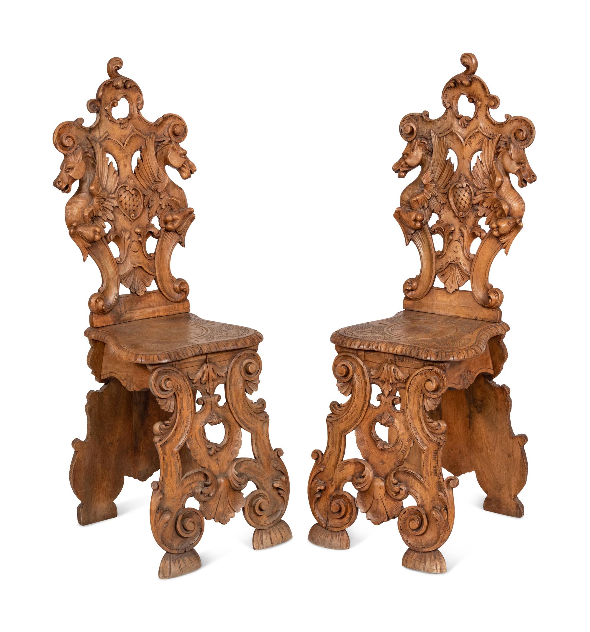 A Pair of Italian Carved Walnut Sgabello Chairs