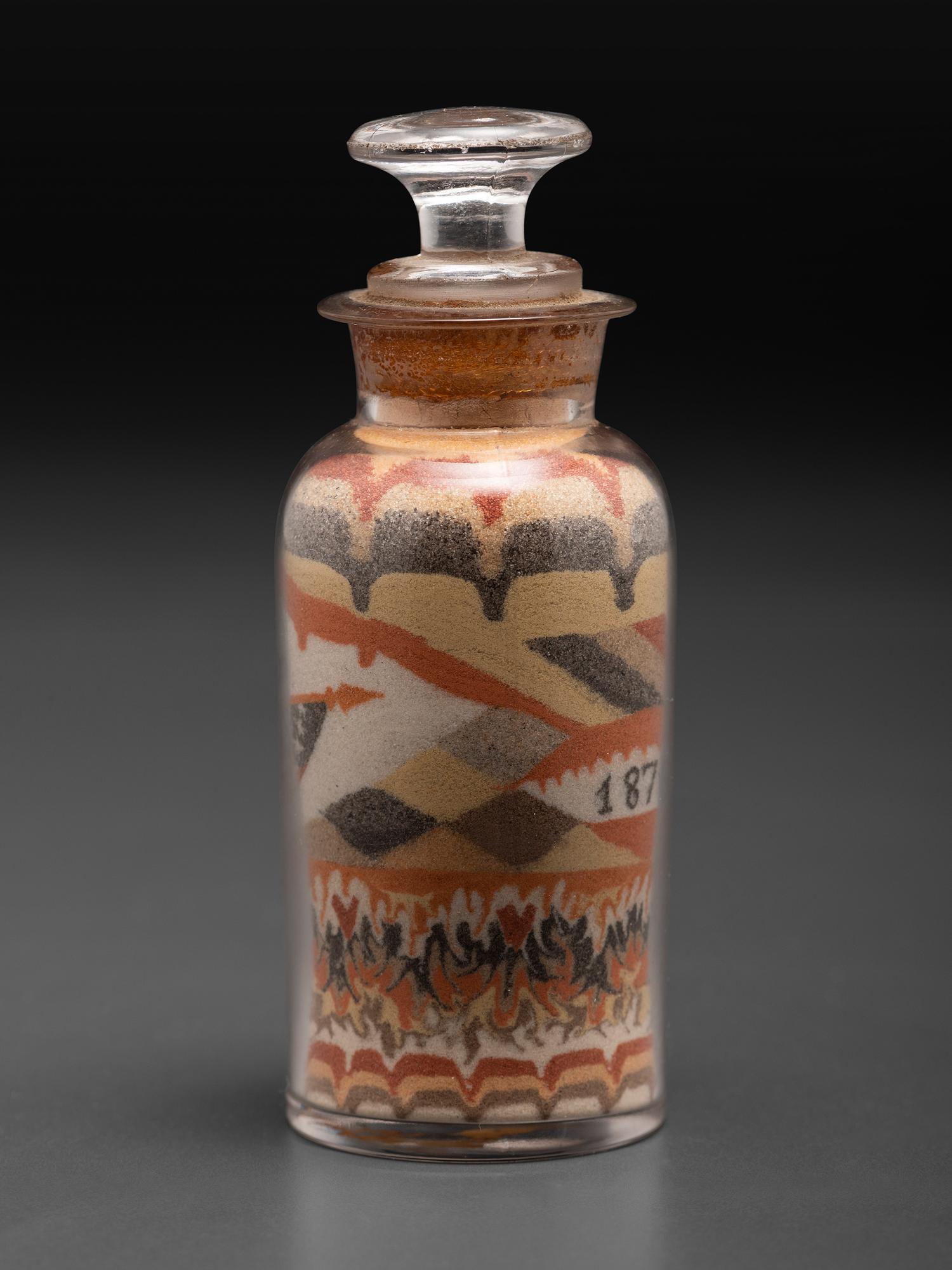 An Early Andrew Clemens (American, 1857-1894) Eagle Sand Bottle