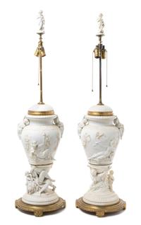 A Pair of Gilt Bronze Mounted Bisque Porcelain Urns Height 44 1/2 inches.