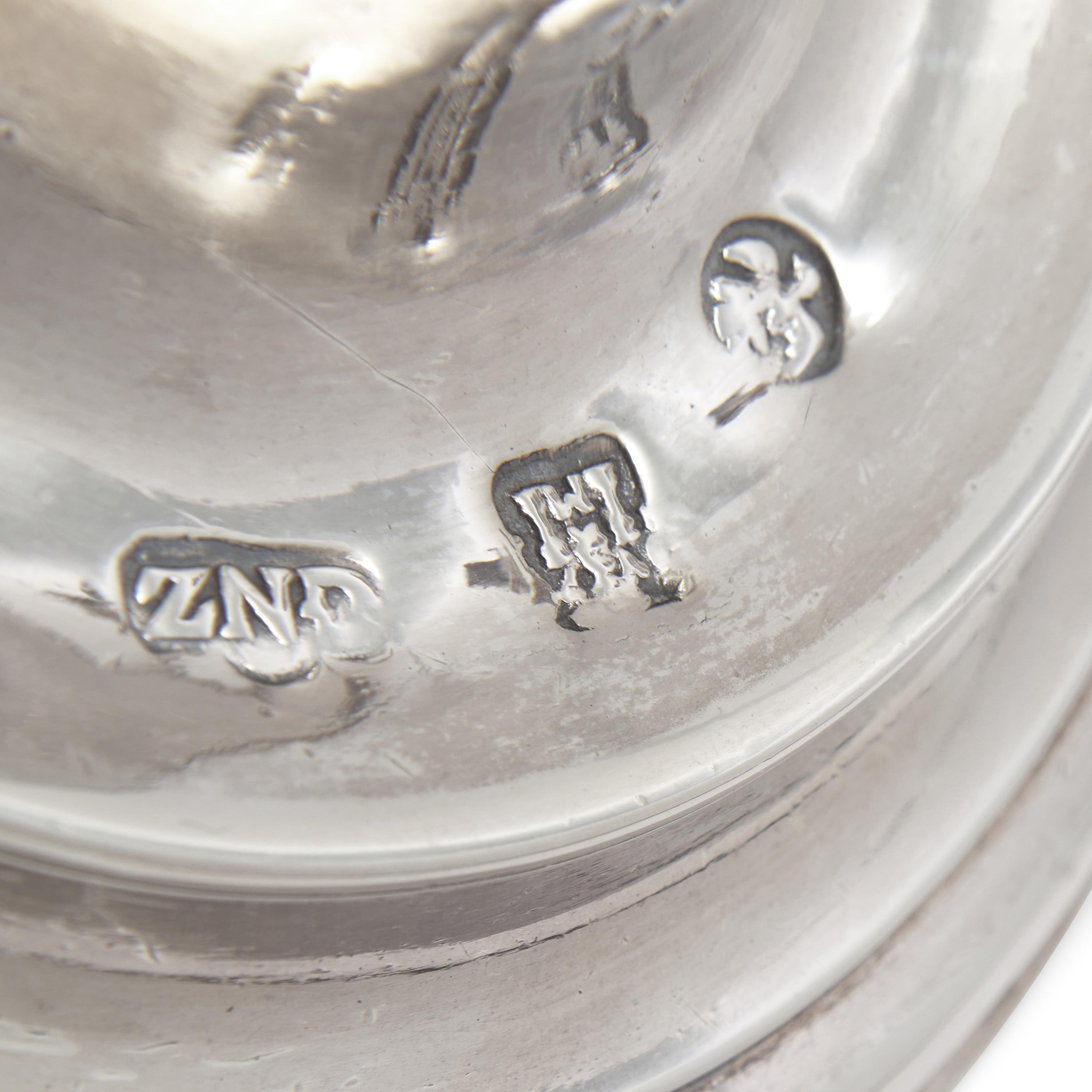 A Pair of Spanish Silver Candlesticks