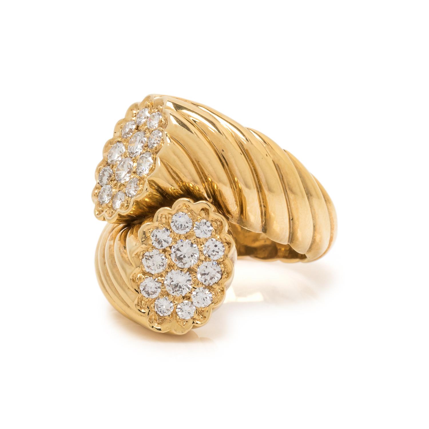 SCHLUGER, YELLOW GOLD AND DIAMOND BYPASS RING