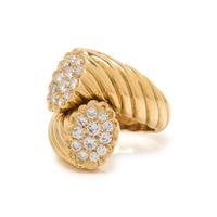 SCHLUGER, YELLOW GOLD AND DIAMOND BYPASS RING