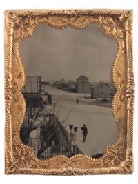 [CIVIL WAR]. Quarter plate tintype of a soldier walking down the street of a likely Carolina town, with sign for oyster saloon partly visible.