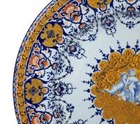 Two Continental Majolica Chargers — 20TH CENTURY