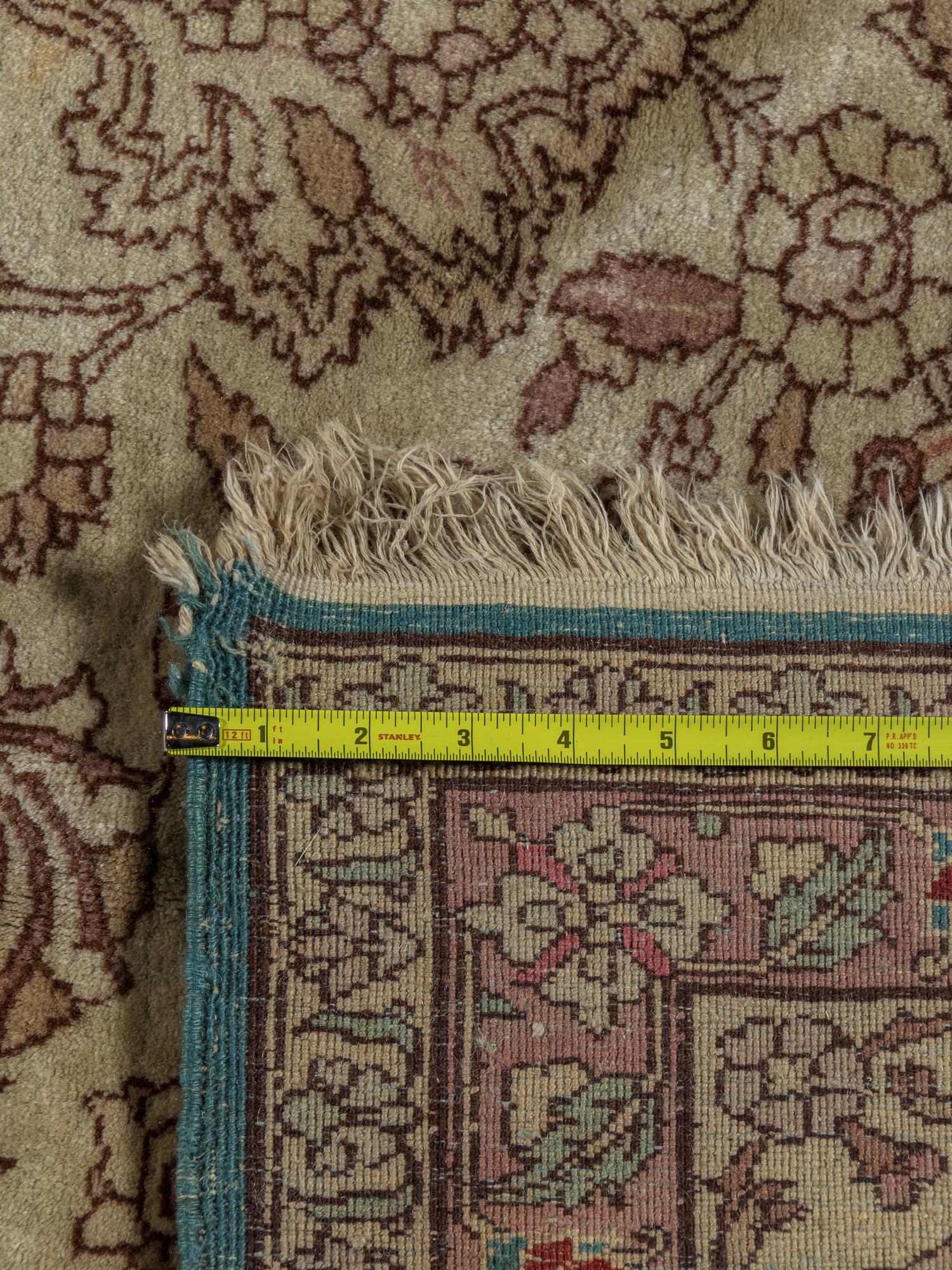 A Tabriz Wool Rug
