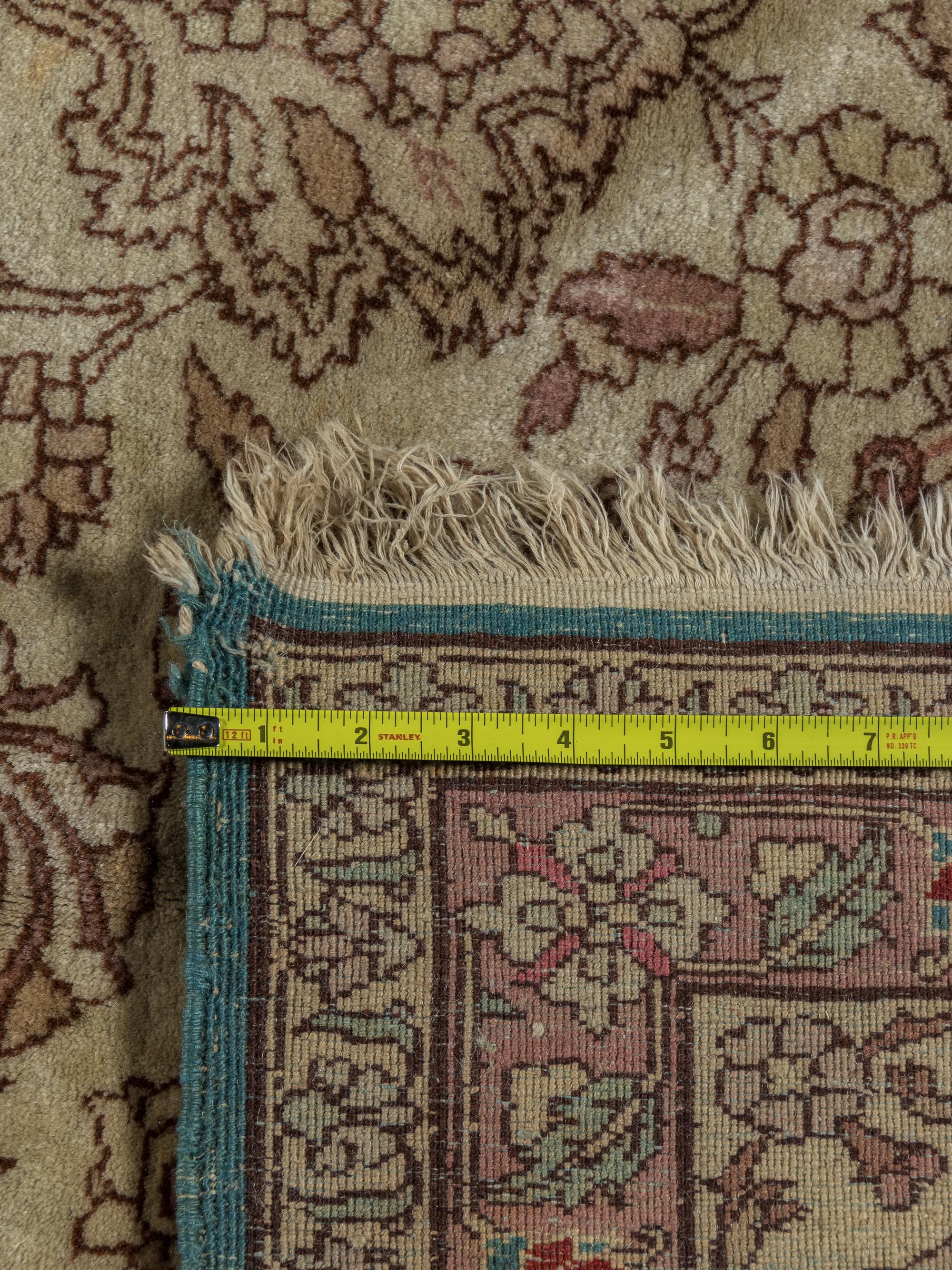 A Tabriz Wool Rug