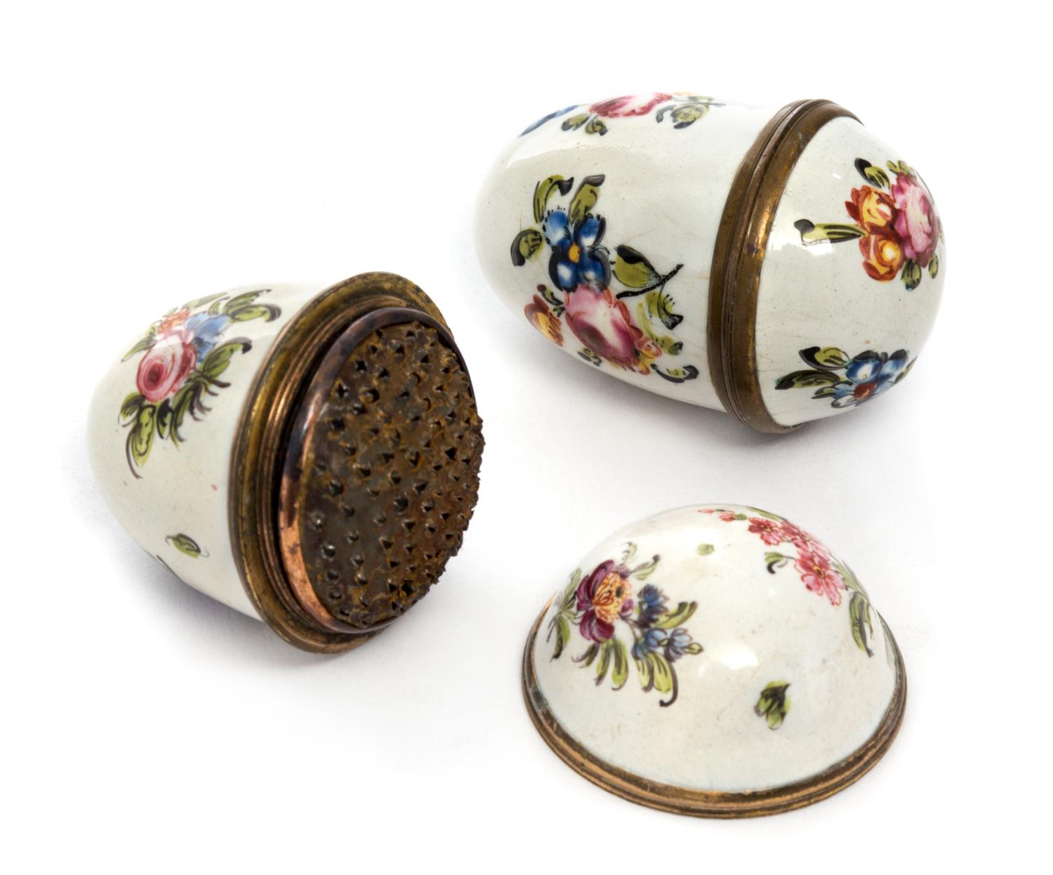 A Pair of South Staffordshire Enameled Nutmeg Graters Width 1 1/2 inches.