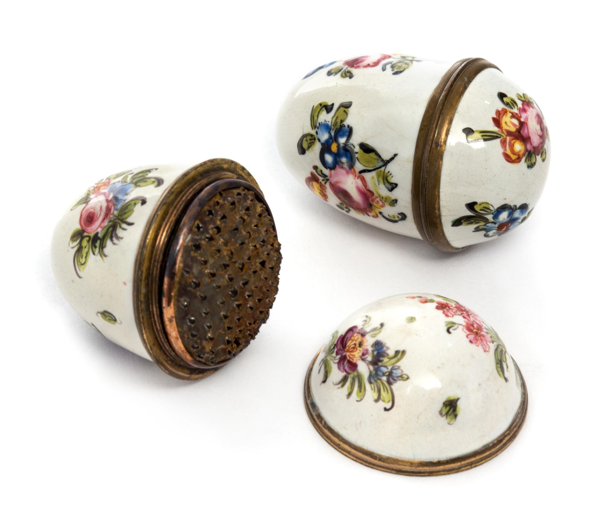 A Pair of South Staffordshire Enameled Nutmeg Graters Width 1 1/2 inches.