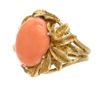 An 18 Karat Yellow Gold and Coral Ring, 11.90 dwts.