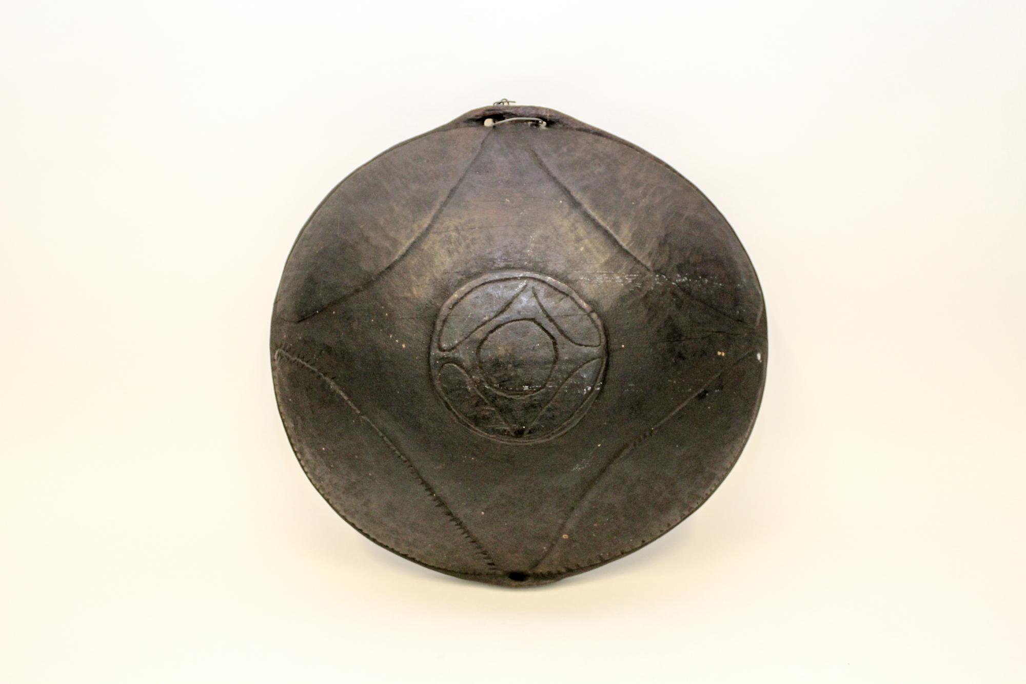 An African Style Wood Shield. Width 16 5/8 inches.