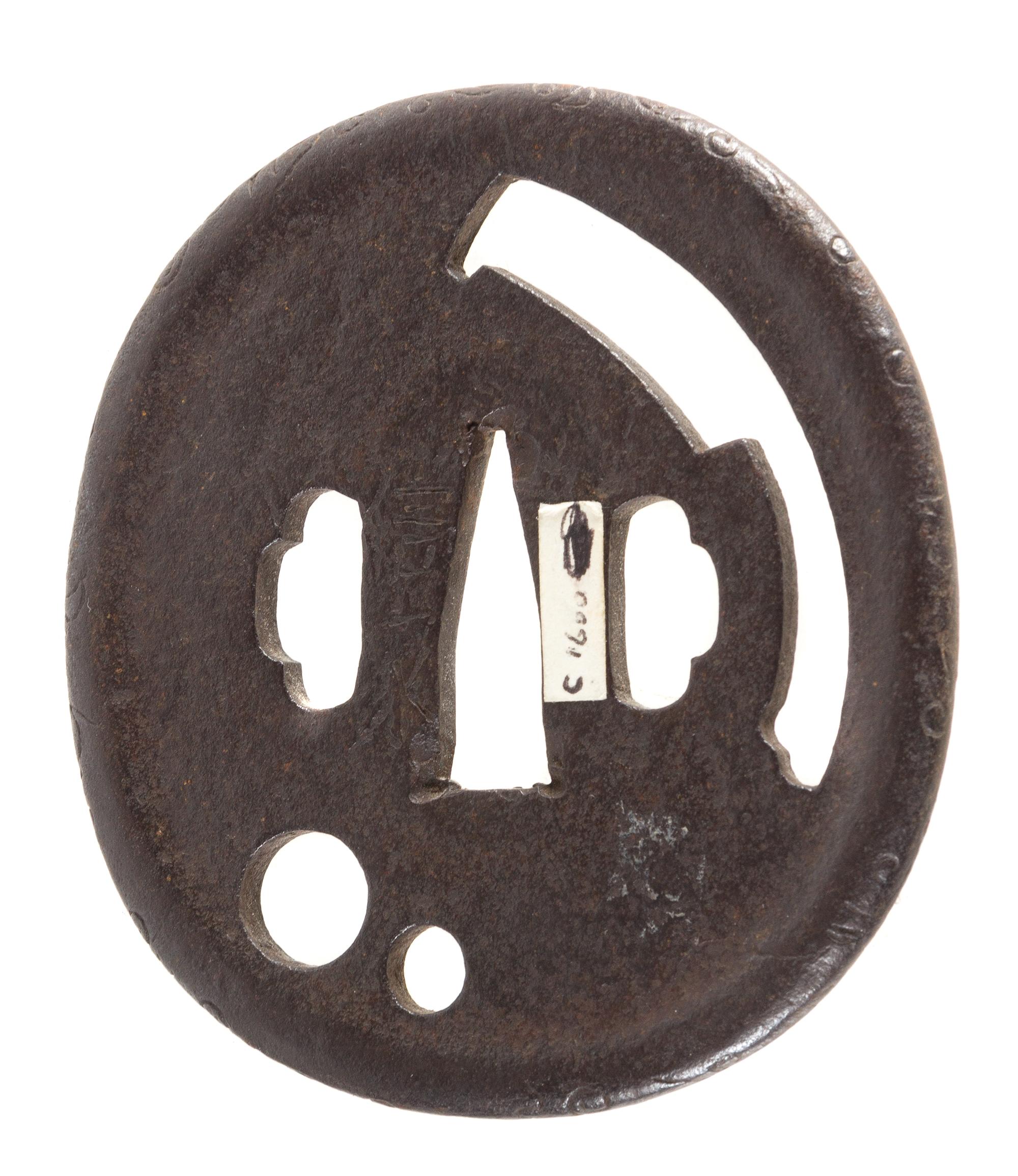 An Iron Tsuba Height 3 1/4 inches. — 17TH CENTURY