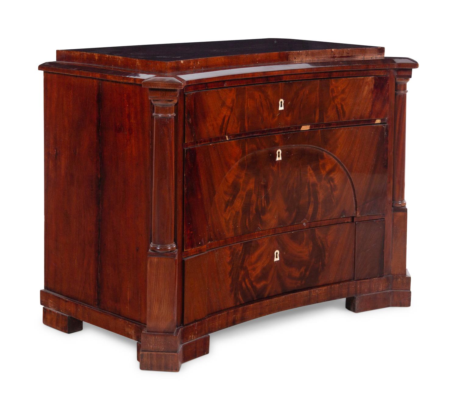 A German Mahogany Concave-Front Chest of Drawers