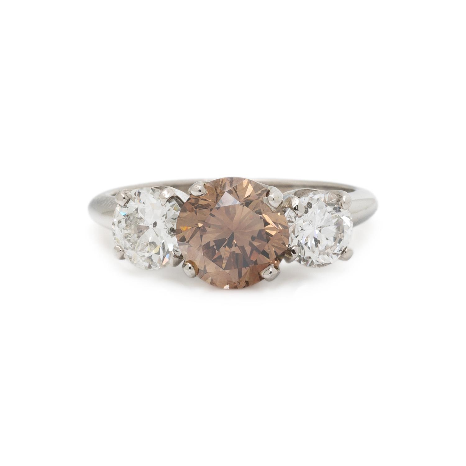 FANCY COLORED DIAMOND AND DIAMOND RING