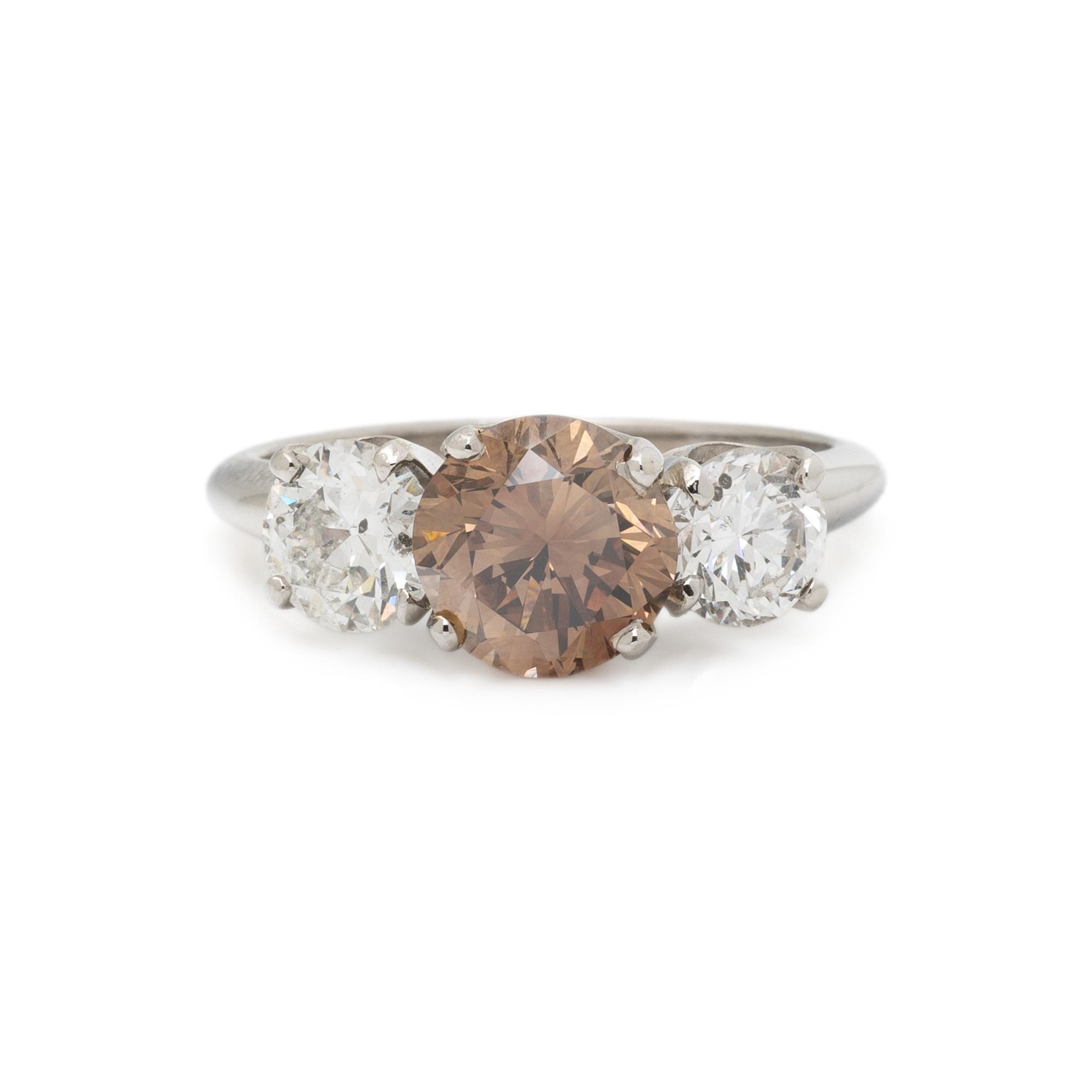 FANCY COLORED DIAMOND AND DIAMOND RING
