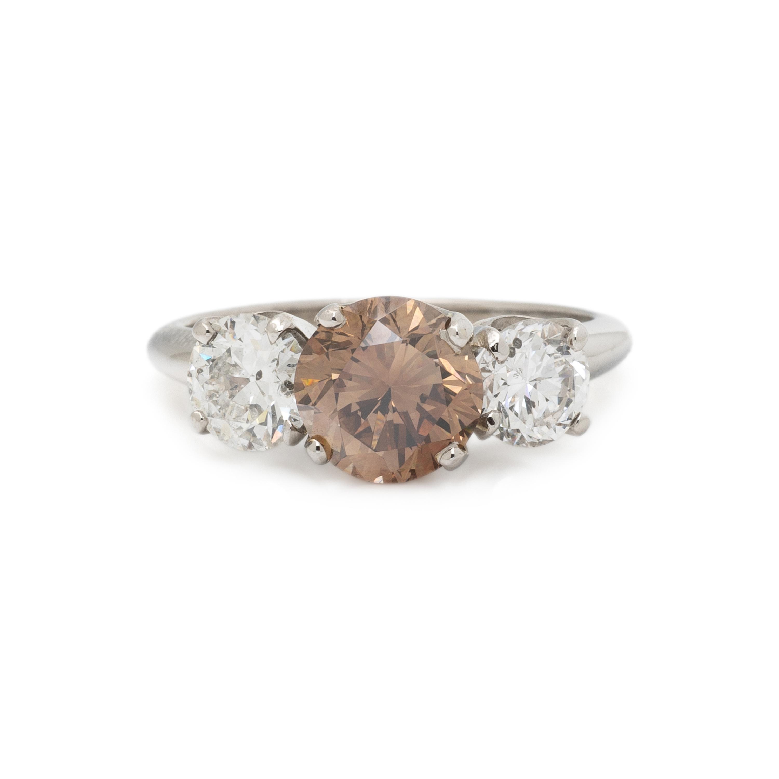 FANCY COLORED DIAMOND AND DIAMOND RING