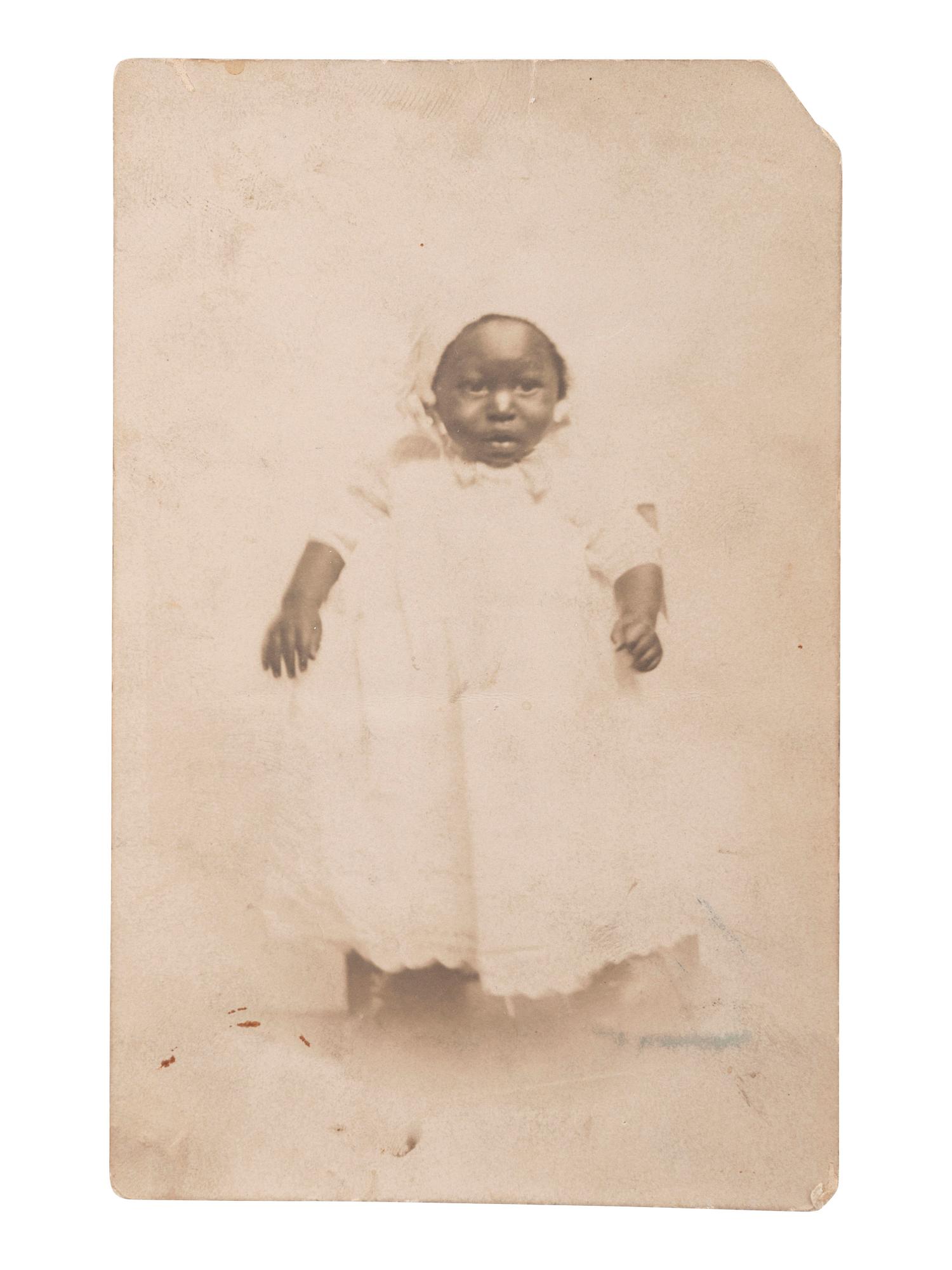 [EARLY PHOTOGRAPHY]. A group of 6 photographs of African American subjects, highlighted by lovely portrait of African American woman with white child.