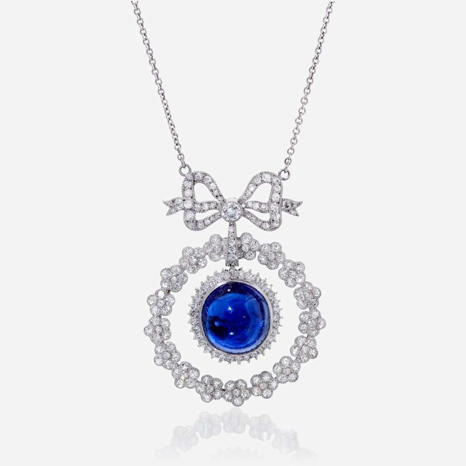 A sapphire, diamond, and eighteen karat white gold necklace