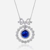 A sapphire, diamond, and eighteen karat white gold necklace