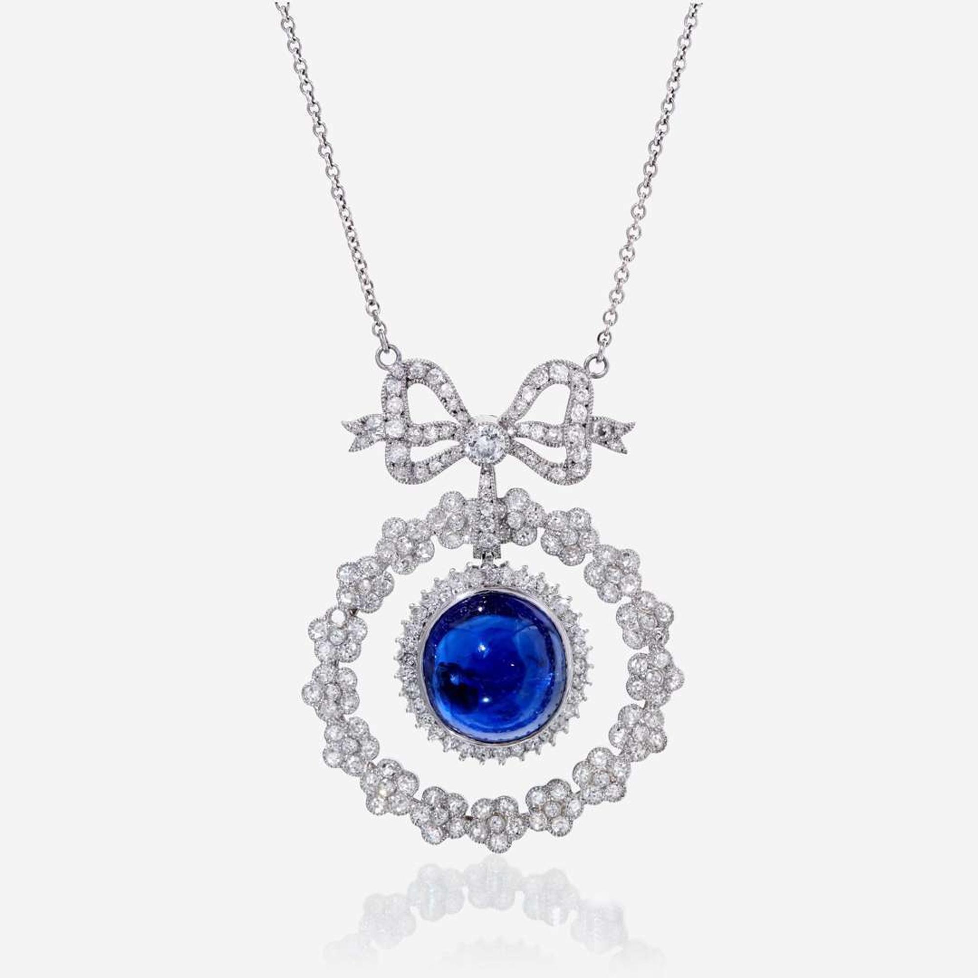 A sapphire, diamond, and eighteen karat white gold necklace