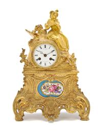A French Gilt Metal and Sevres Style Porcelain Inset Figural Mantel Clock, Miroy Freres, Height 13 1/4 inches.