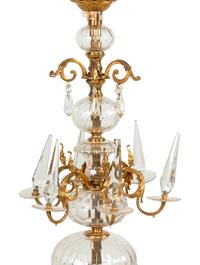 A Continental Brass and Glass Twelve-Light Chandelier