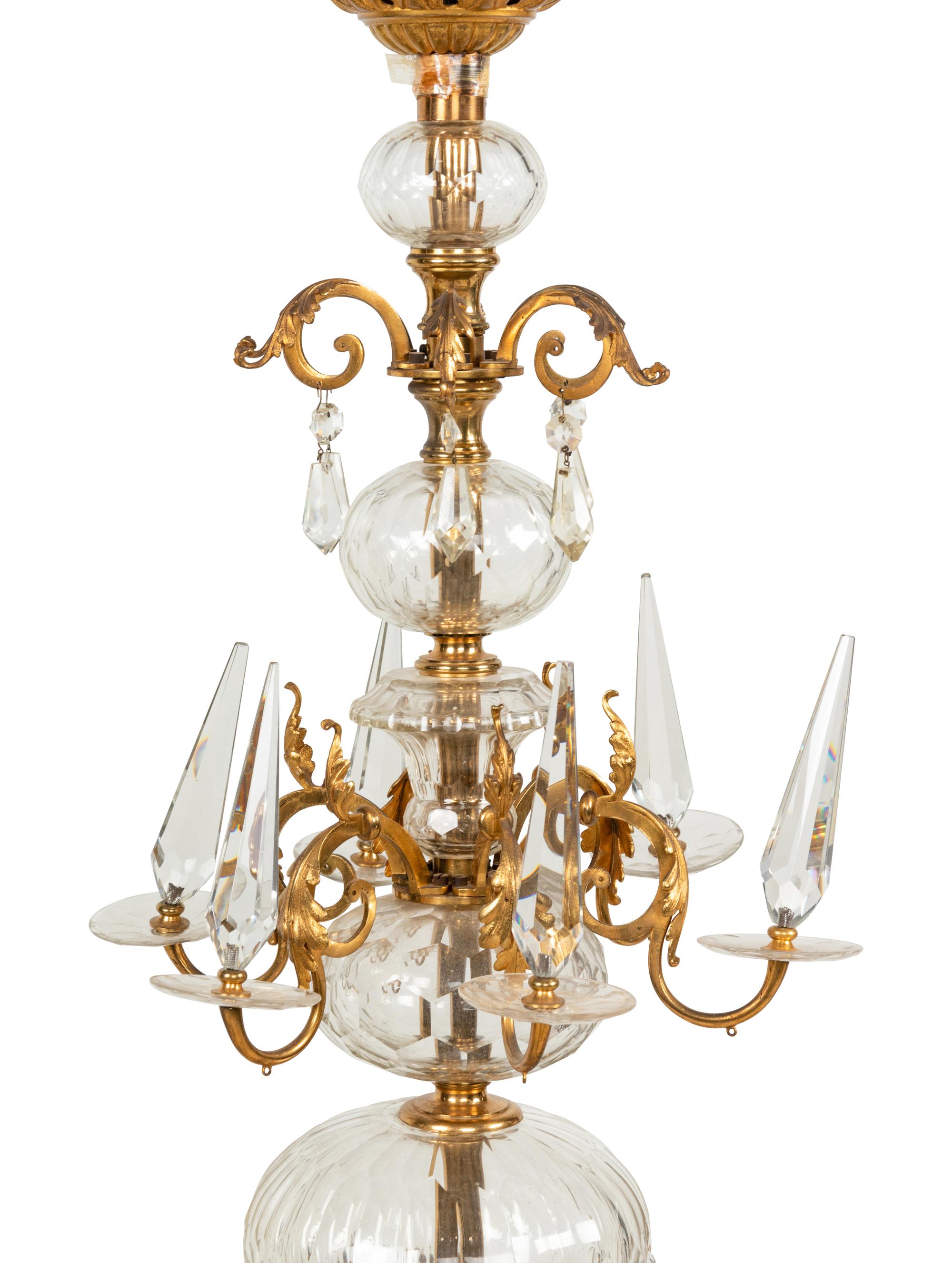 A Continental Brass and Glass Twelve-Light Chandelier