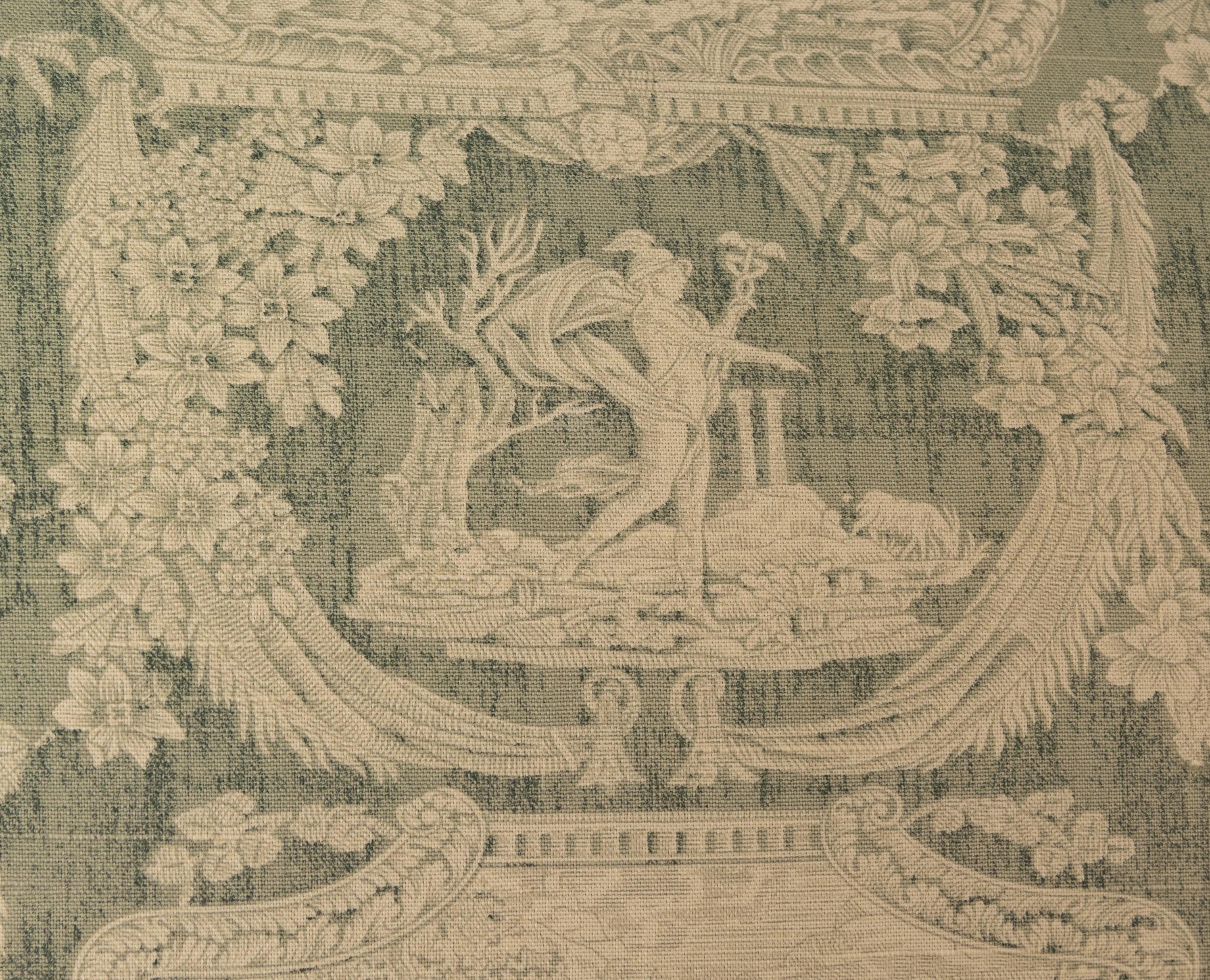A Green and White Toile de Jouy Upholstered Armchair