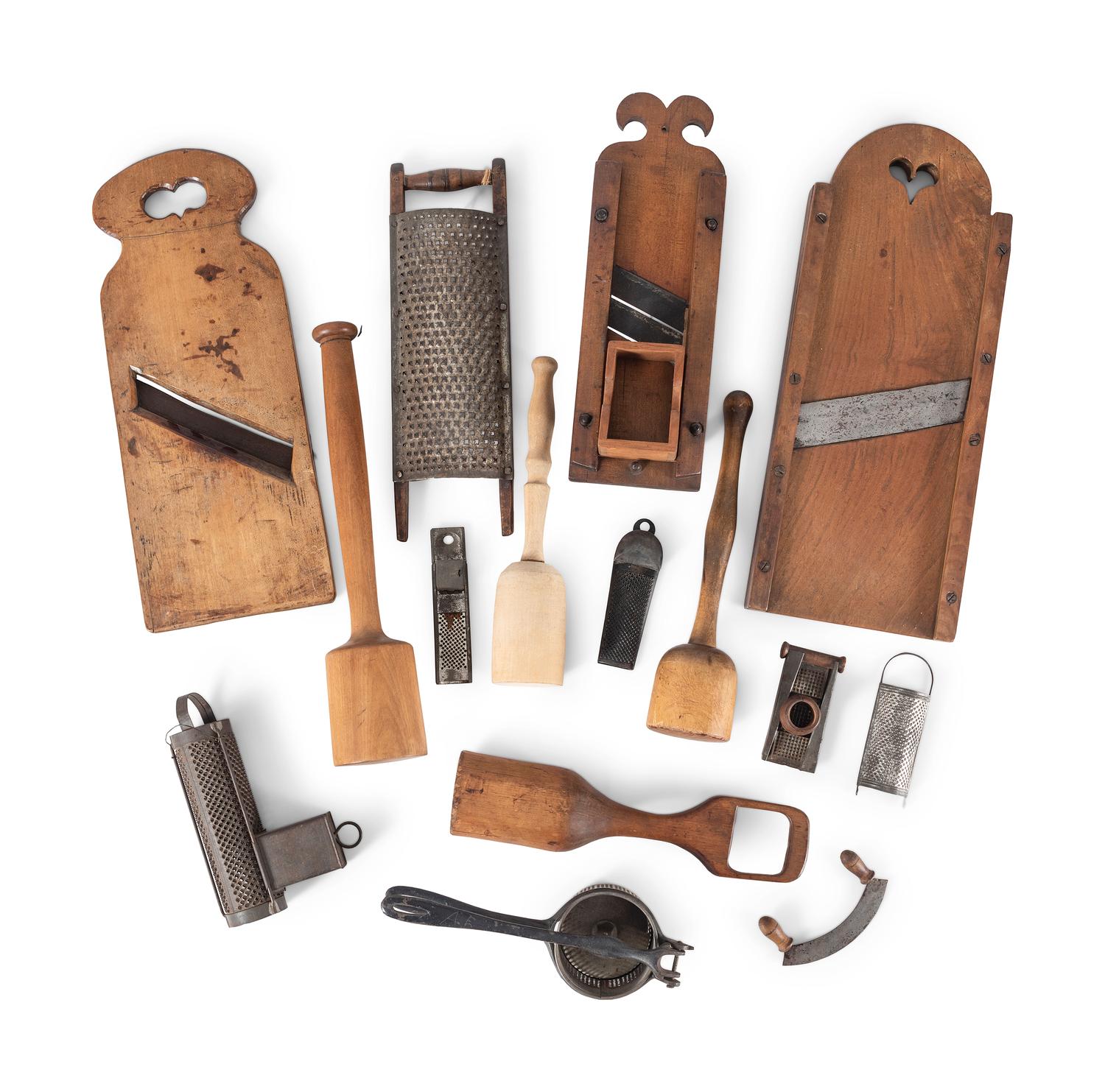 A Group of Wood and Tin Graters, Slicers and Pounders