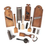 A Group of Wood and Tin Graters, Slicers and Pounders