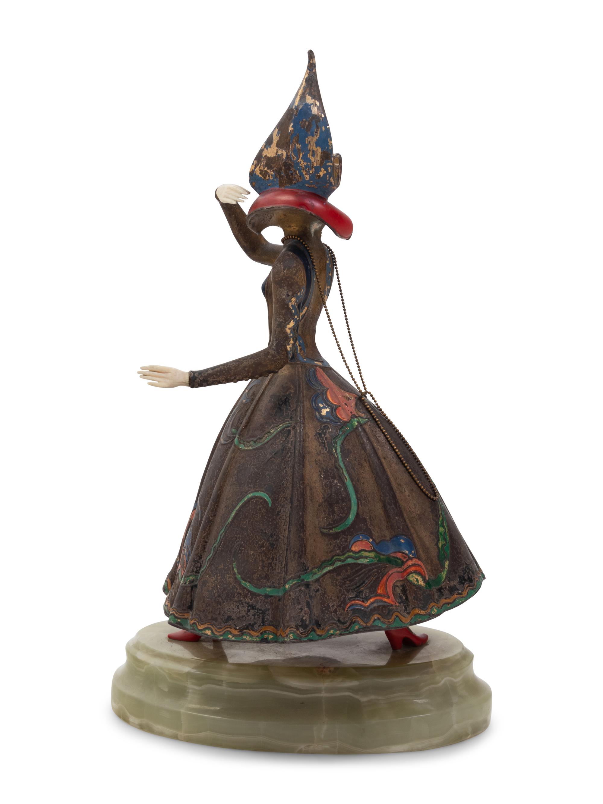 An Art Deco Bronze and Onyx Sculpture