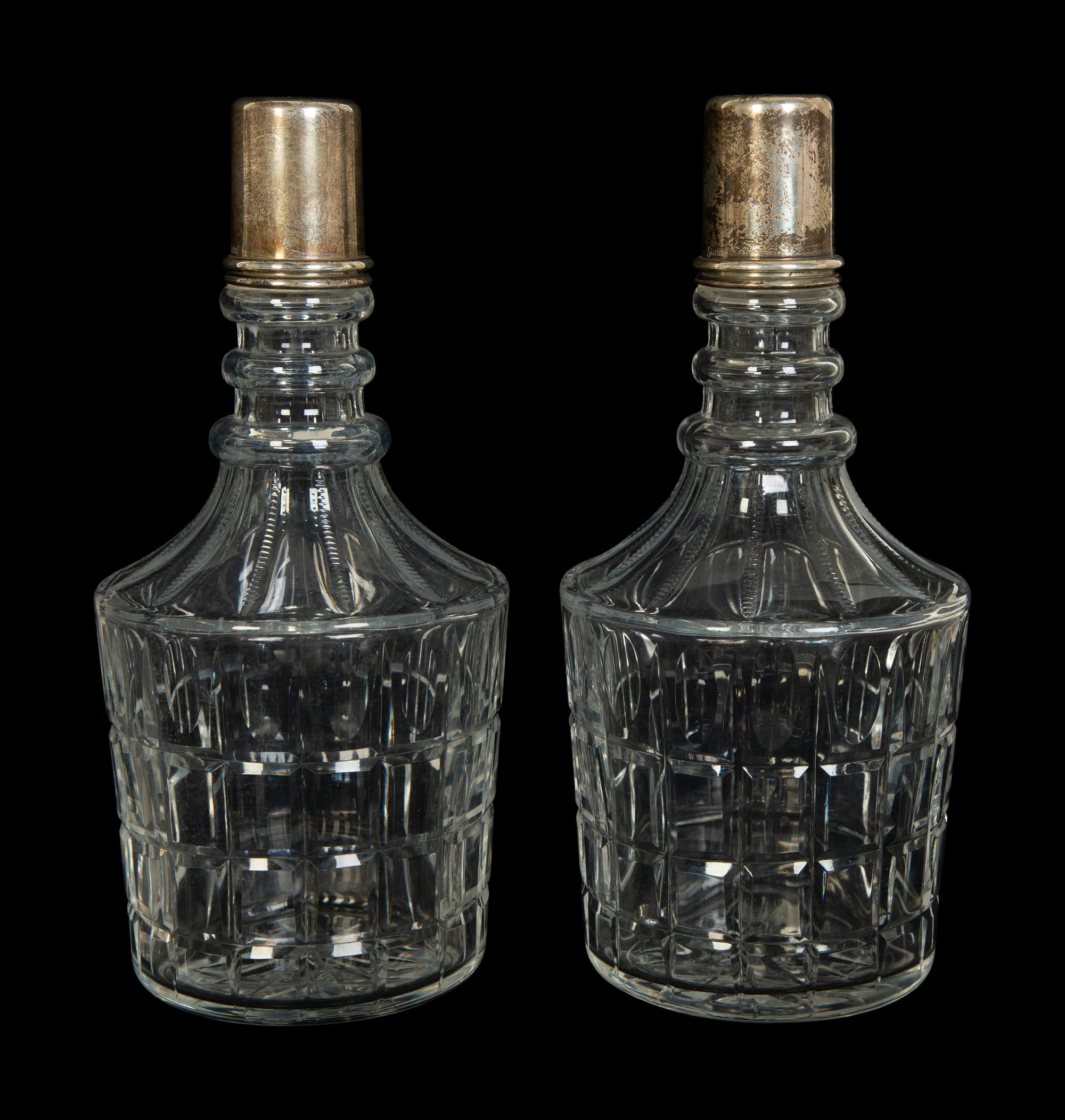 Four American Silver Mounted Cut Glass Decanters