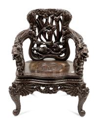 A Chinese Export Carved Hardwood Armchair