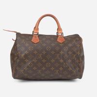 A Louis Vuitton Brown Monogram Speedy 30 Louis Vuitton