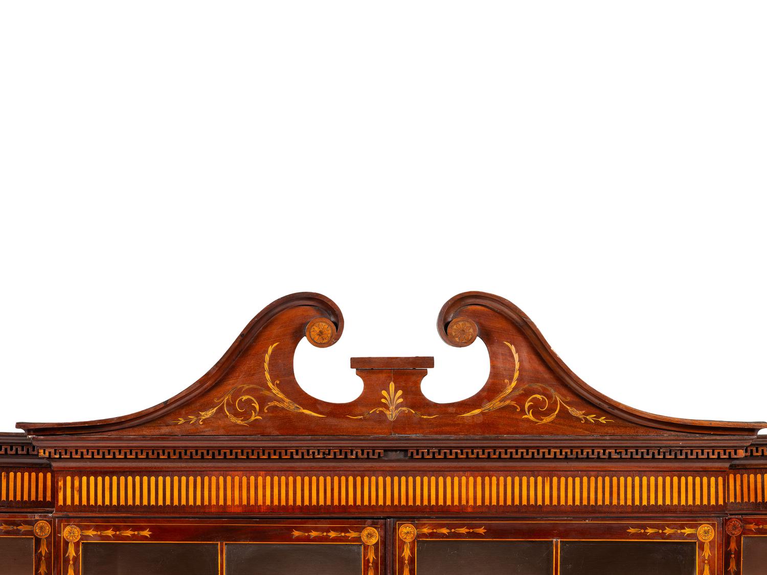 An English Mahogany and Marquetry Breakfront Bookcase