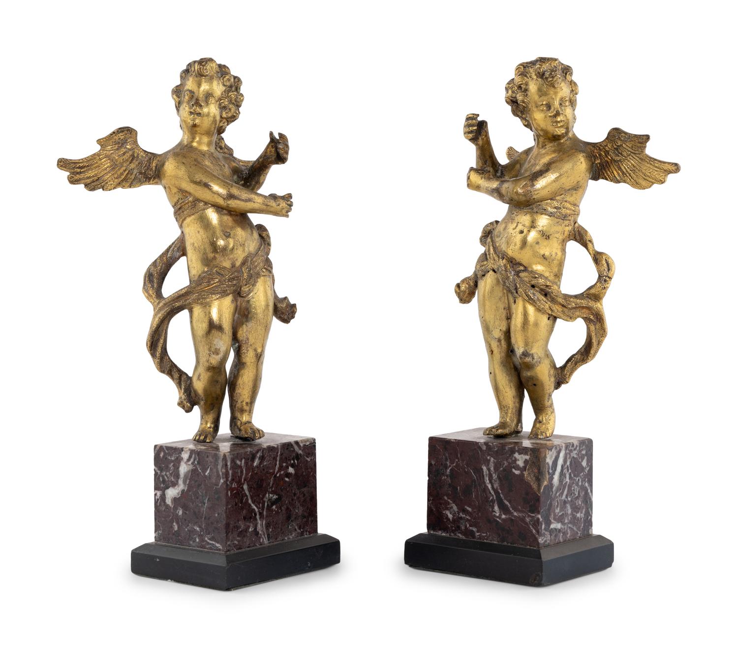 A Pair of Continental Gilt Bronze Figures of Putti