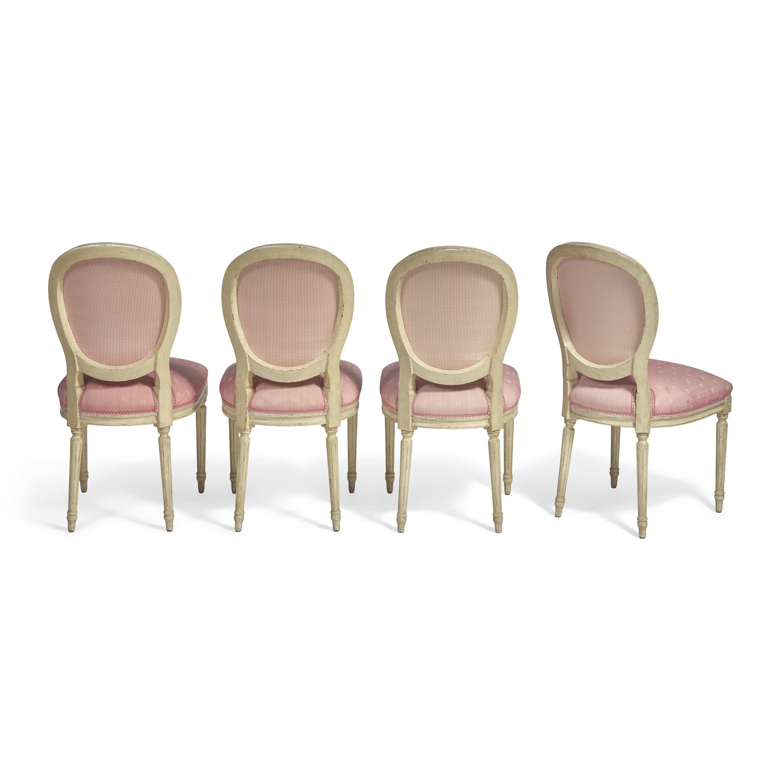 A Set of Four Louis XVI Style White-Painted and Upholstered Fauteuils