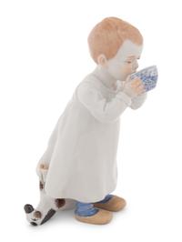 A Meissen Porcelain Figure of a Boy Drinking From a Blue Onion Bowl