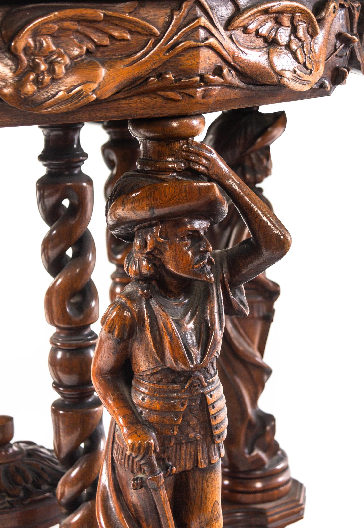 An Italian Carved Walnut and Marquetry Table