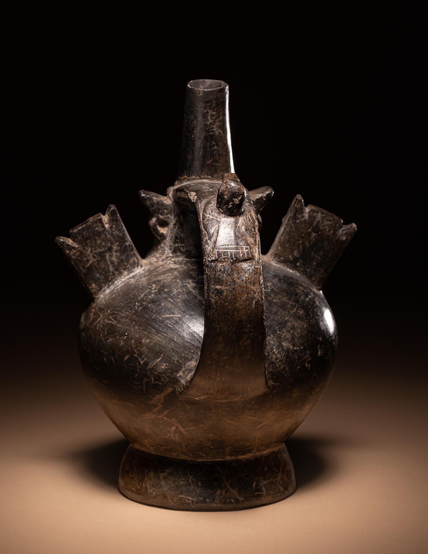 A Sican Blackware Stirrup Vessel