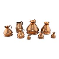 A Group of Eight Copper Wine Measures