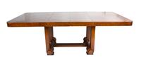 An Art Deco Walnut Dining Table — 20TH CENTURY