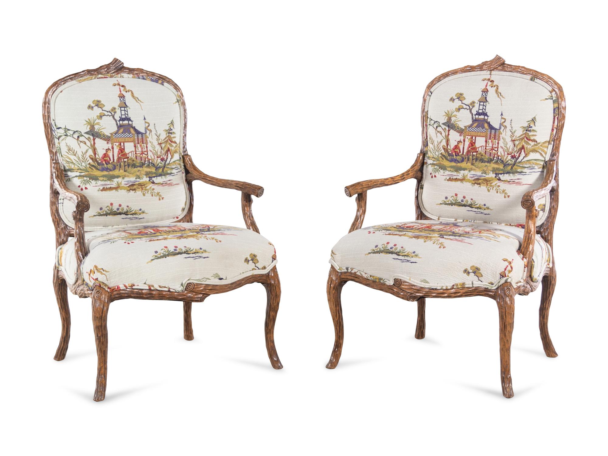 A Pair of Louis XV Style Faux Bois-Carved Fauteuils