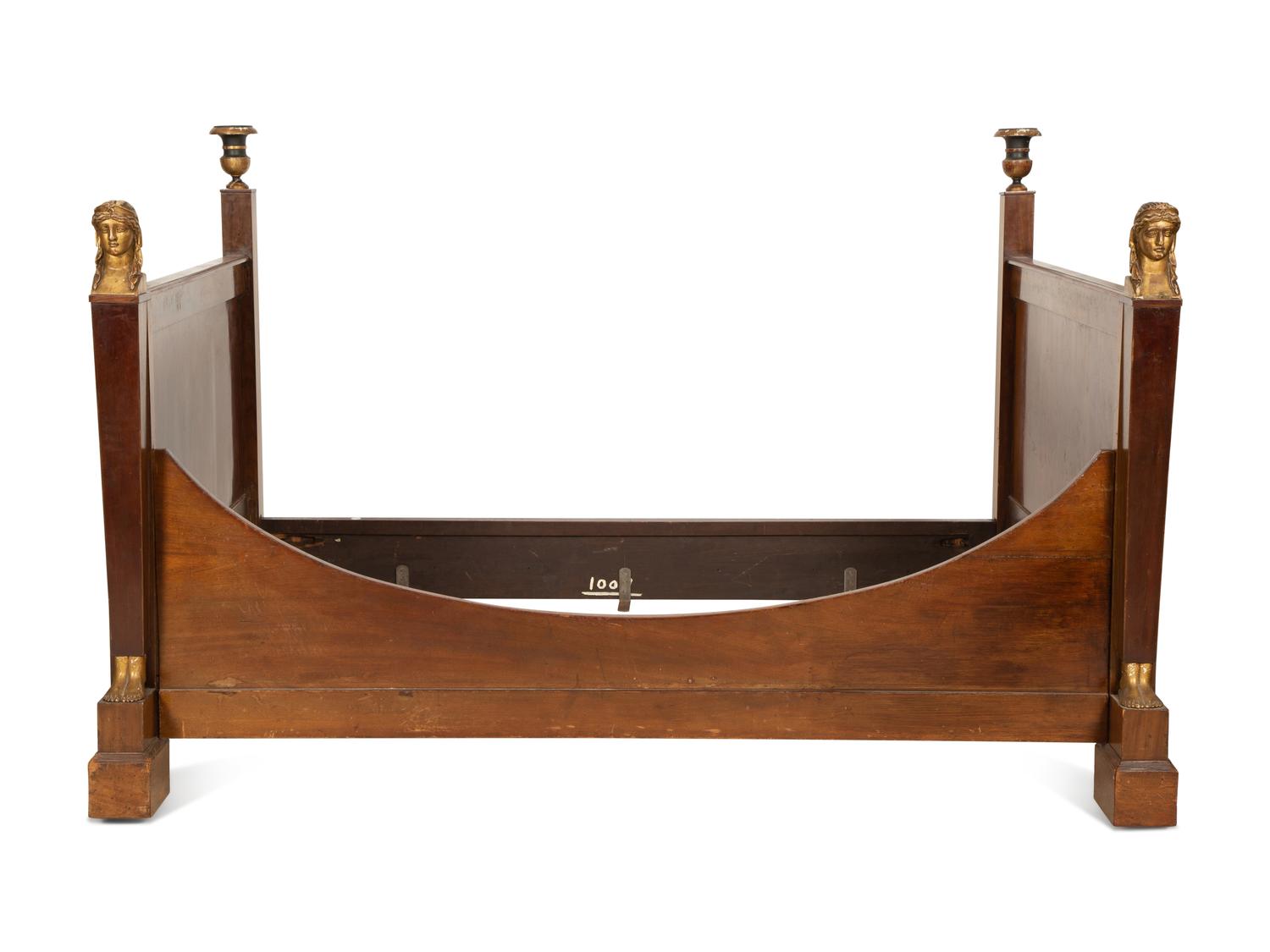 An Empire Mahogany and Parcel Gilt Day Bed