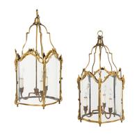A Pair of Louis XV Style Gilt Bronze Three-Light Hall Lanterns